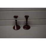 PAIR OF METAL CANDLESTICKS