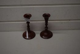 PAIR OF METAL CANDLESTICKS