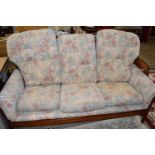 FLORAL UPHOLSTERED THREE SEATER SOFA