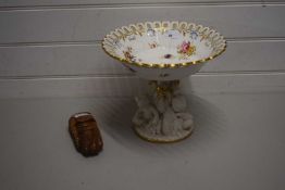 LARGE PORCELAIN TAZZA, THE BOWL SUPPORTED BY THREE CHERUBS IN SEVRE STYLE