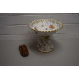 LARGE PORCELAIN TAZZA, THE BOWL SUPPORTED BY THREE CHERUBS IN SEVRE STYLE