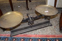PAIR OF VINTAGE IRON AND BRASS SHOP SCALES