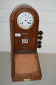 DOMED CLOCK WITH CALENDAR BELOW AND FOUR ADJUSTABLE KNOBS TO THE SIDE