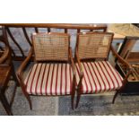 PAIR OF STRIPED UPHOLSTERED CANE BACKED CHAIRS