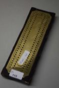 CRIBBAGE COUNTER MARKED OUT IN BRASS ON WOODEN FRAME