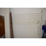 CONTINENTAL CREAM PAINTED BED FRAME WITH BARLEY TWIST UPRIGHTS AND PANELLED ENDS DECORATED WITH