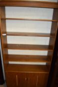 LIGHT OAK FINISH BOOKCASE CABINET WITH CUPBOARD BASE