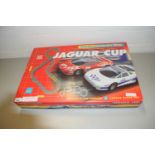 MICRO SCALEXTRIC JAGUAR CUP SET (NOT CHECKED FOR COMPLETENESS)