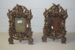 TWO COPPER PHOTOGRAPH FRAMES DECORATED WITH CHERUBS