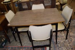 RETRO MID CENTURY MELAMINE AND EBONISED WOOD EXTENDING DINING TABLE AND FOUR CHAIRS (5)