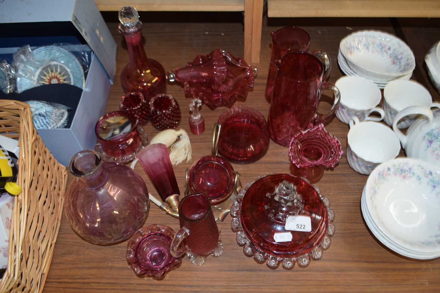 Mixed Lot: Various assorted cranberry glass jugs, covered dish, various small vases etc