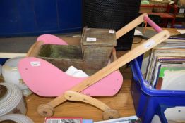Small painted dolls cot and a further dolls pram (2)