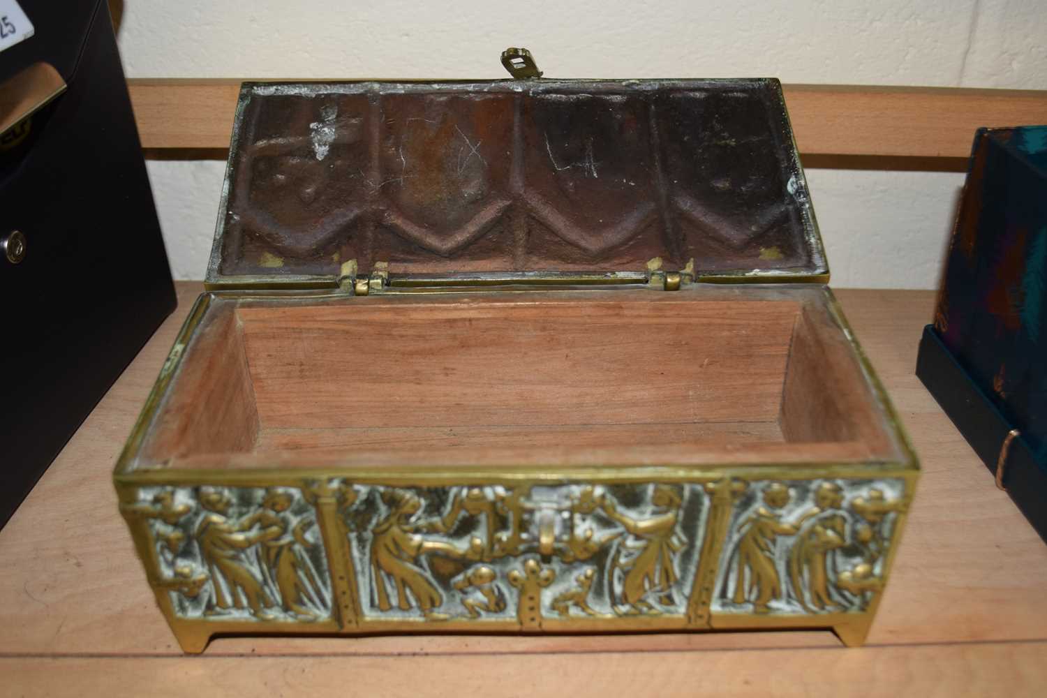 Heavy gauge brass table top box decorated with figures