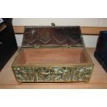 Heavy gauge brass table top box decorated with figures