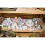 Mixed Lot: Various assorted animal ornaments, porcelain flowers, clown on a tricycle etc