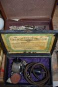 Vintage Hamilton-Beach massage machine together with a case of various assorted medical