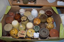 Collection of various pottery honey pots