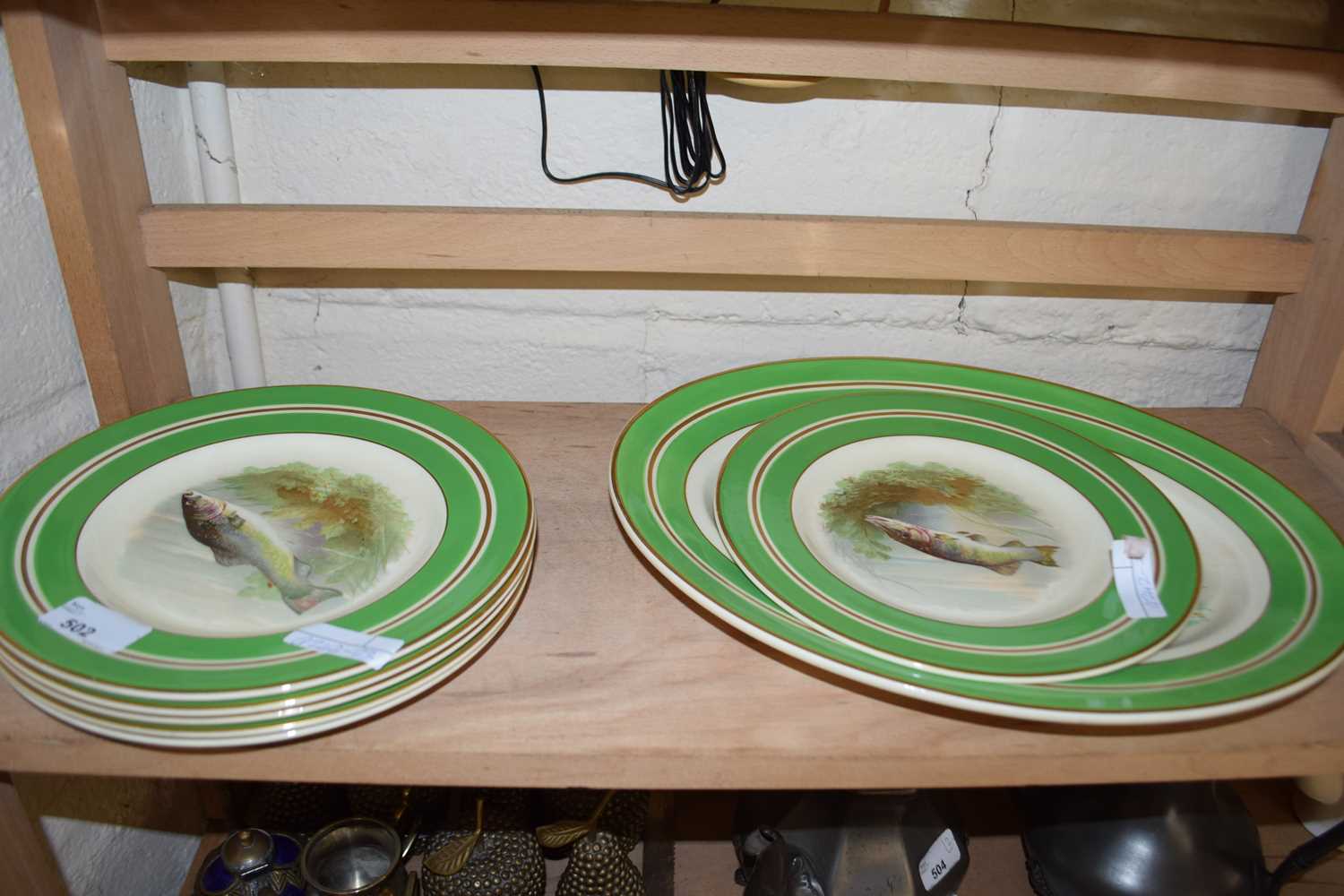 Quantity of woods ivory ware plates decorated with fish