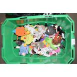 Box of various McDonalds toys and Ty Beanie Babies