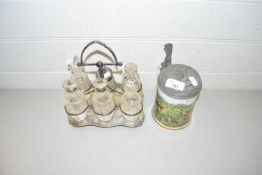 Silver plated cruet with glass bottles together with a Franklin porcelain pewter lidded tankard