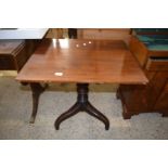 19th Century mahogany flip top pedestal table on turned column and tripod base