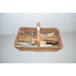 Basket of various assorted silver plated and steel cutlery