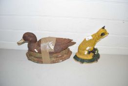 Two cast iron door stops, one duck and one fox