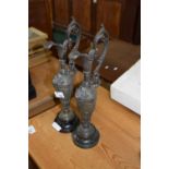 Pair of bronzed metal classical form ewers