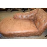 Brown leather upholstered chaise longue style sofa