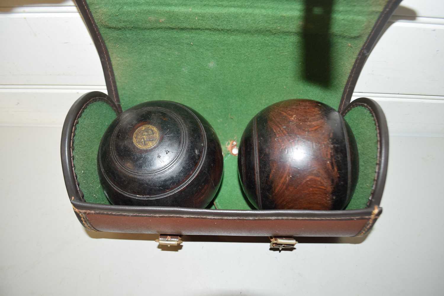 Case of two hardwood lawn bowls