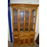 MODERN LIGHT OAK LOUNGE DISPLAY CABINET WITH GLAZED TOP SECTION AND DRAWER AND CUPBOARD BASE