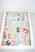 Display tray of various modern earrings