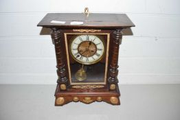 Late 19th/early 20th Century mantel clock in architectural wooden case with applied metal mounts