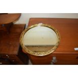 Circular gilt framed wall mirror