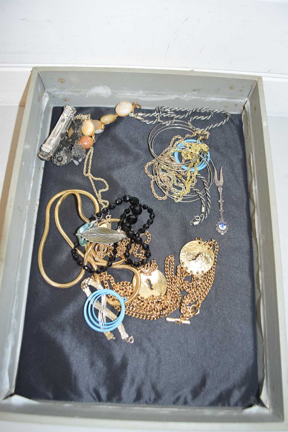 Display tray of various costume jewellery,necklaces, bangles, pendants etc