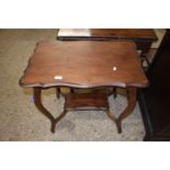 Edwardian mahogany two tier occassional table on outswept legs