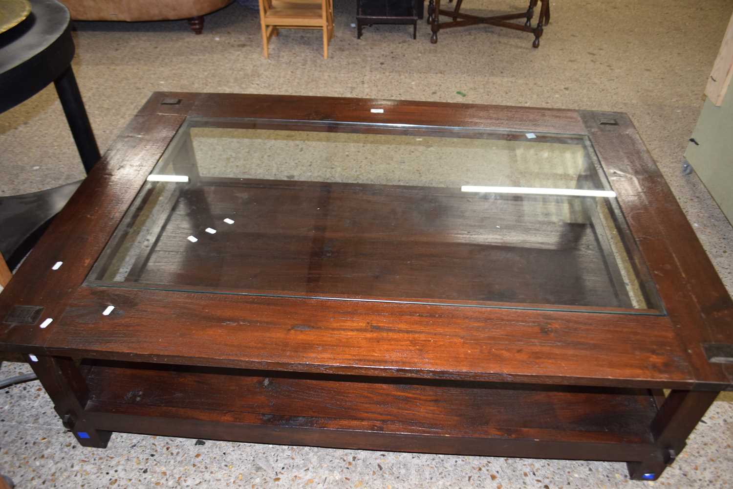 Modern large hardwood rectangular coffee table with glass inset top and shelf beneath