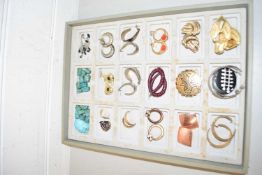 Display tray of various costume jewellery, earrings