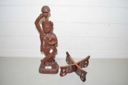 Modern carved wooden South East Asian deity together with a hardwood stand