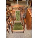 Late 19th or early 20th Century folding campaign style chair with green upholstery