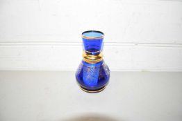 Small blue and gilt bohemian glass vase