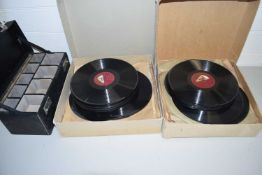 Two boxes of 78 rpm records and a small storage cabinet