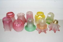 Collection of various cranberry and other coloured glass light shades