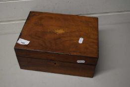 Wooden box containing various assorted items to include a small hip flask, thimbles etc