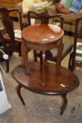 Small oak circular topped sewing table together with a similar oval coffee table