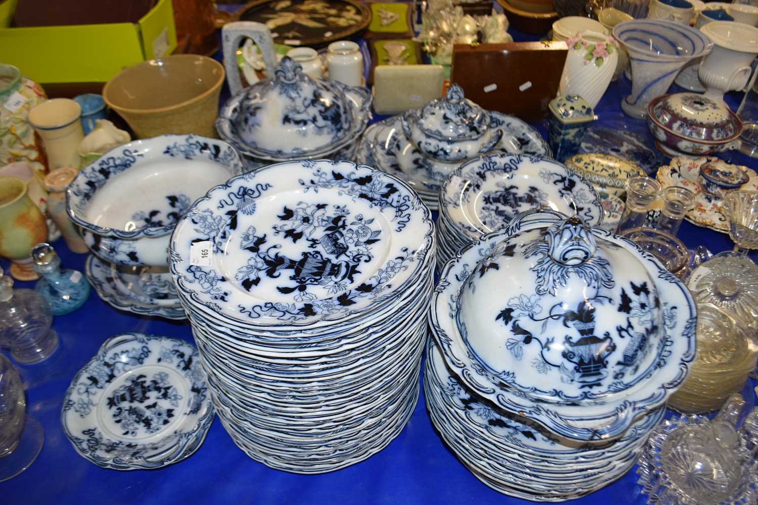 Quantity of Victorian Flow Blue dinner wares to include covered vegetable dishes, meat plates,