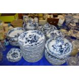 Quantity of Victorian Flow Blue dinner wares to include covered vegetable dishes, meat plates,
