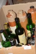 One box of various bottles assorted spirits, many bottles opened