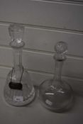 Two cut glass decanters