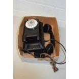 Vintage black wall mounted telephone marked PTT